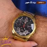 ساعت تگ هویر مردانه طلایی فلزی اتوماتیک 1342/1 نمای روی دست