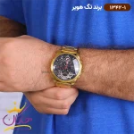 ساعت تگ هویر مردانه طلایی فلزی اتوماتیک 1342/1 نمای روی دست از دور