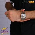 ساعت مردانه داتیس فلزی نقره ای طلایی 8587/2 نمای روی دست از دور