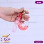 جاکلیدی آکواریومی طرح دونات قرمز
