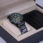 ساعت عقربه ای بیگوتی مردانه فلزی مشکی صفحه سبز BG.1.10561/6 همراه با جاکارتی درون جعبه