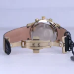 نمای باز ساعت مچی مردانه الگانس بند چرم مشکی قاب طلایی G 1239/1