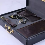 ست کیف کتی چرم و عینک مردانه چرمسال قهوه ای پوست ماری