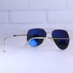 دسته عینک آفتابی ری بن مردانه فلزی طلایی عدسی مشکی RB 3026 F/5