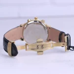 نمای باز ساعت مچی مردانه الگانس چرم صفحه مشکی قاب طلایی G 1236/10